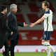 Spurs manager Jose Mourinho and Harry Kane shake hands after a March 14 loss to Arsenal.